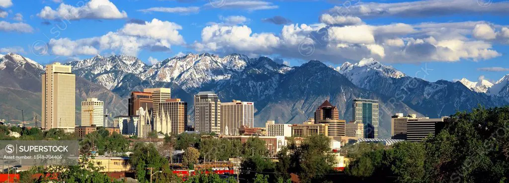 Panoramic view of the Salt Lake City skyline and the snow-covered Wasatch Mountains at back, Utah, USA