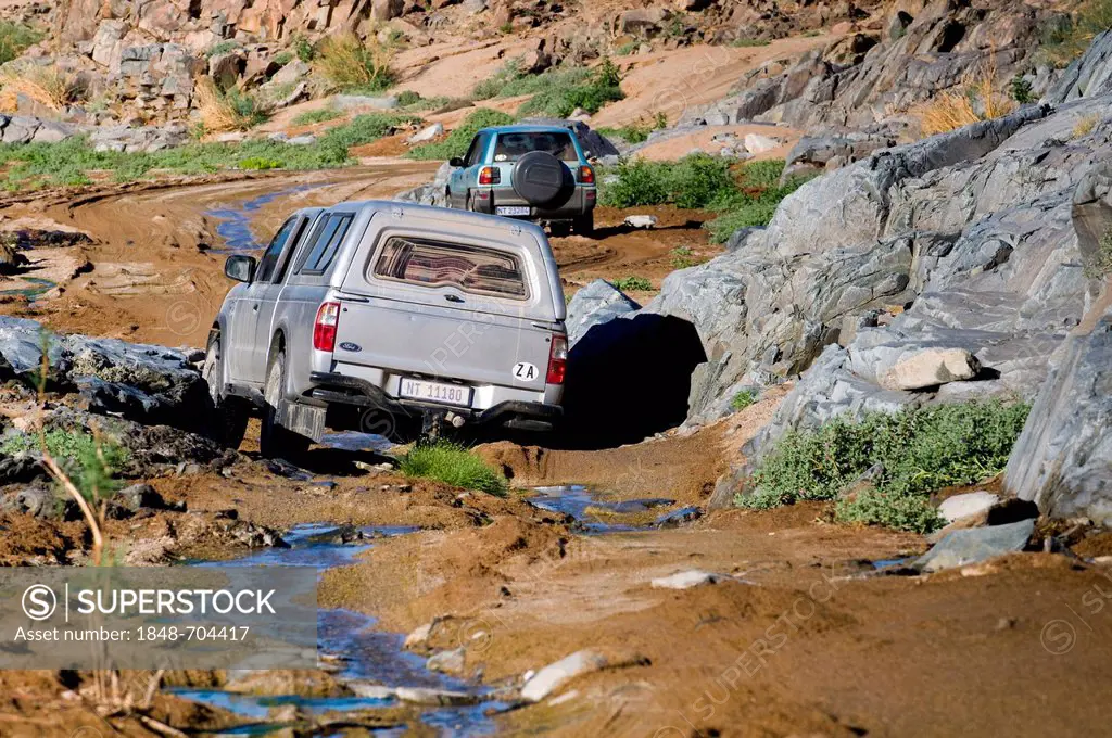 Car on a road, crossing a river, Richtersveld National Park, Northern Cape, South Africa, Africa