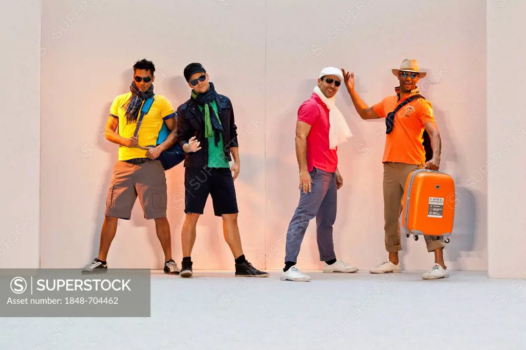4 young men, models performing in the Spring and Summer Fashion Show 2012 in Pilatusmarkt in Kriens, Lucerne, Switzerland, Europe