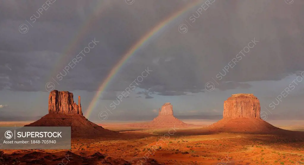Double rainbow during a rain shower after a thunderstorm in the evening light, mesas, West Mitten Butte, East Mitten Butte, Merrick Butte, Monument Va...