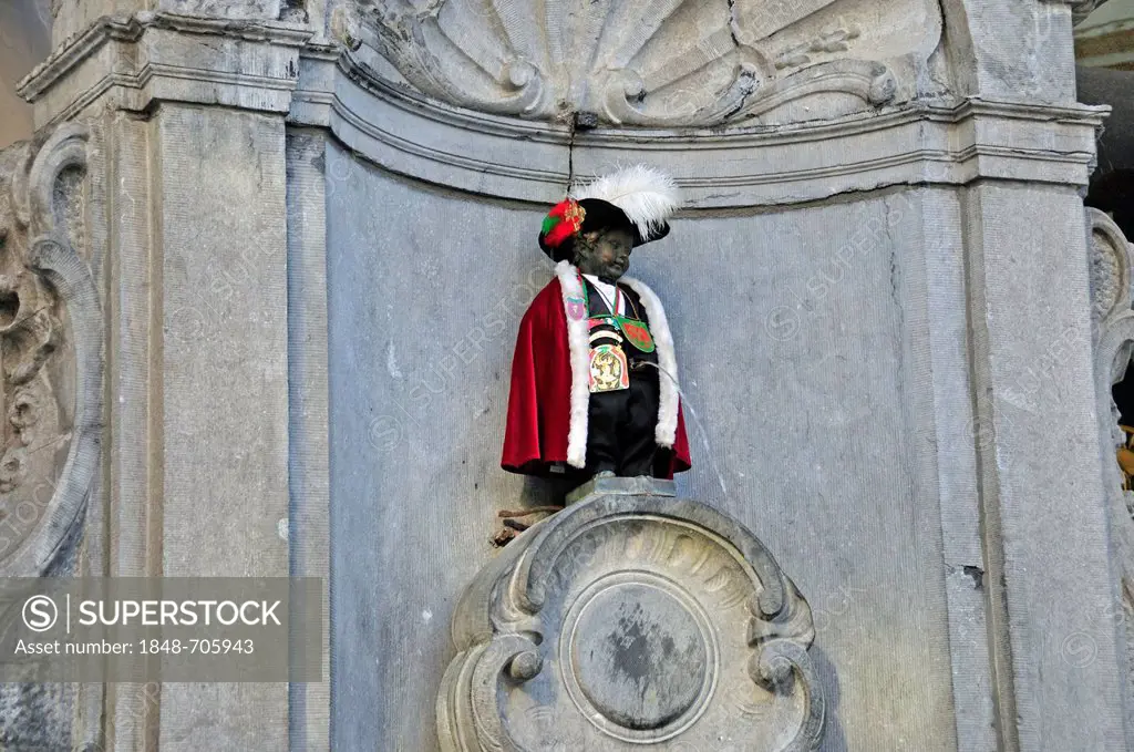 Manneken Pis or Petit Julien, wearing the Brotherhood of the Knights of St Michael habit, fountain figure of a boy urinating, sculpted by Jeorme Duque...
