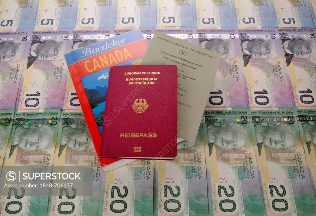 International driving license, passport of the Federal Republic of Germany, guide book for Canada, various Canadian dollar banknotes