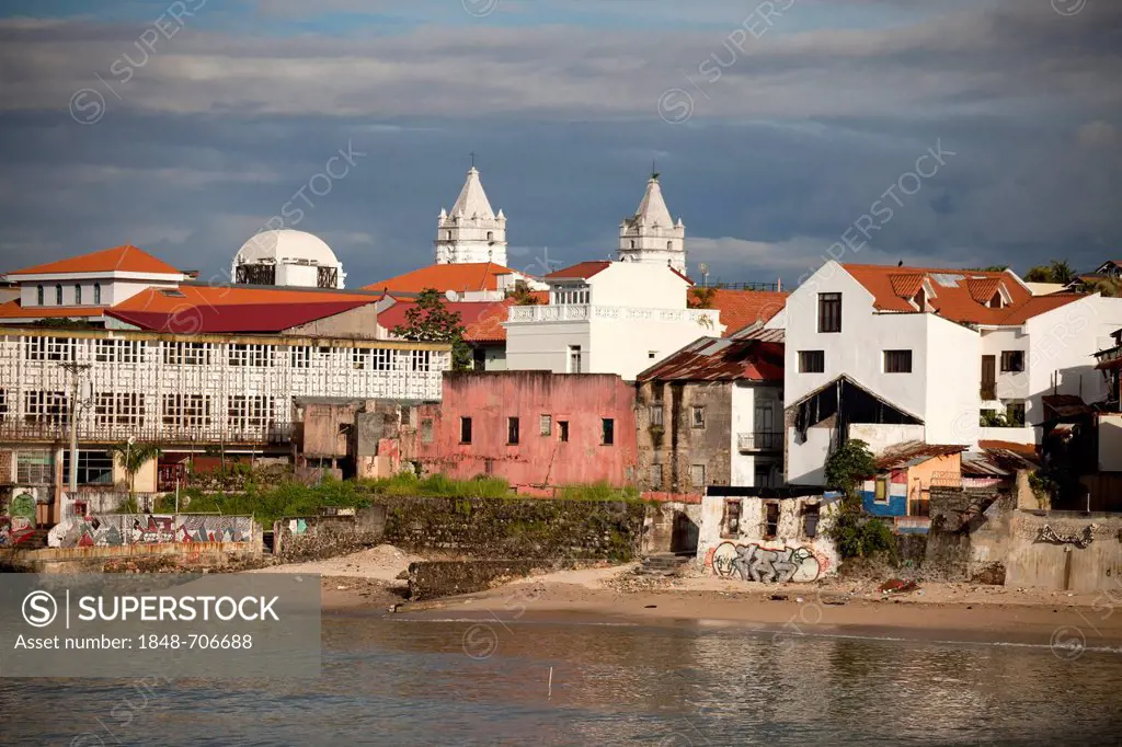 Small beach in front of the Old City, Casco Viejo, with the towers of the Cathedral, Panama City, Panama, Central America