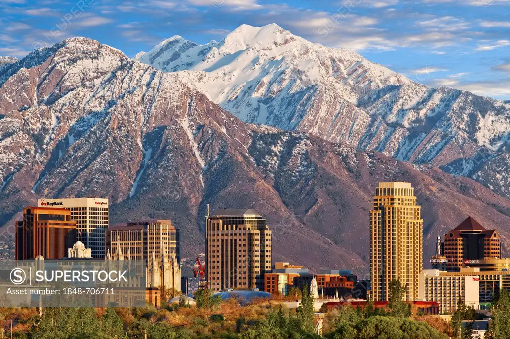 Skyline of downtown Salt Lake City with the towering Wasatch Mountain range at back, Utah, USA