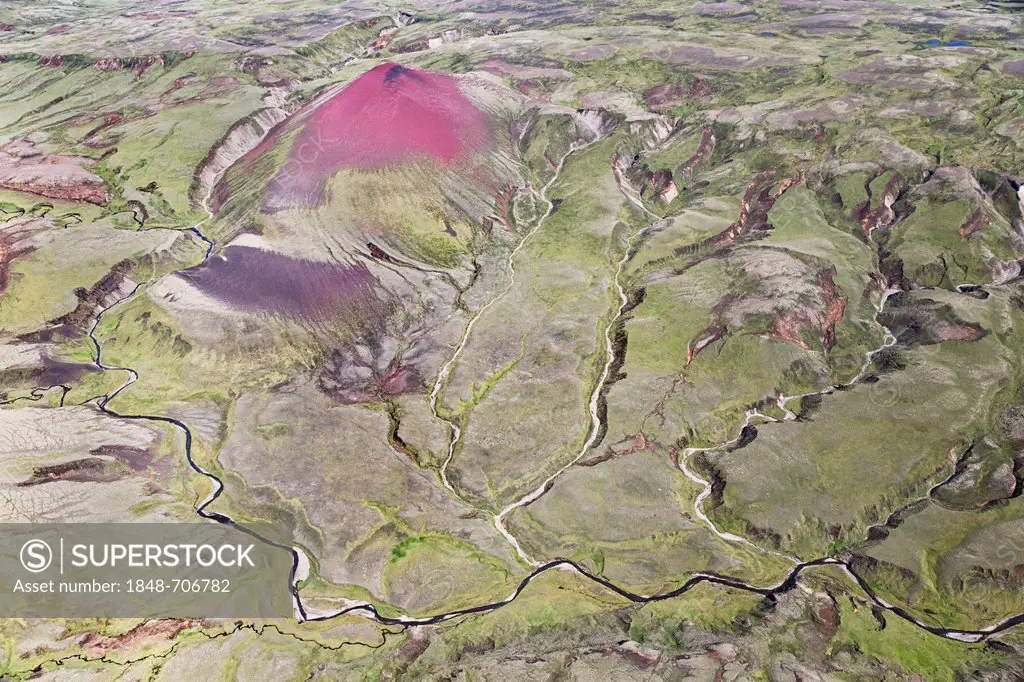 Aerial view, a bright red rhyolite mountain surrounded by the moss-covered landscape on the southern coast of Iceland, Iceland, Europe