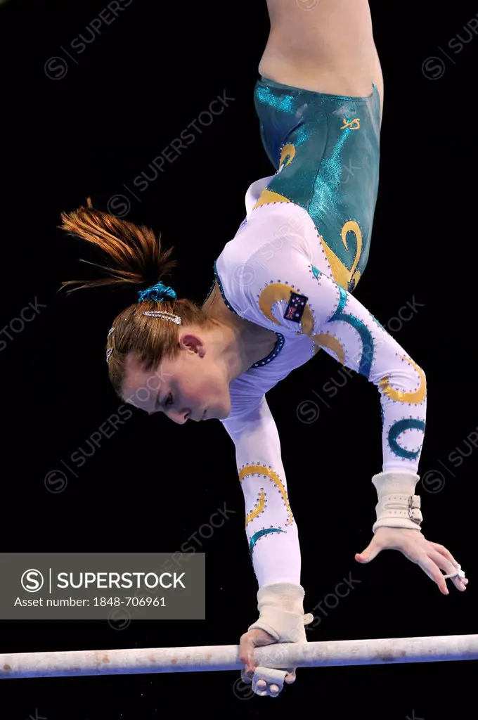 Lauren Mitchell, AUS, performing on uneven bars, EnBW Gymnastics World Cup, 11 to 13 Nov 2011, 29th DTB Cup, Porsche-Arena, Stuttgart, Baden-Wuerttemb...