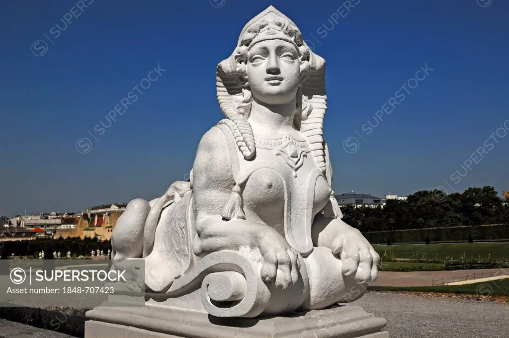Sculpture of a sphinx against a blue sky, Oberes Schloss Belvedere palace, Prinz-Eugen-Strasse street 27, Vienna, Austria, Europe