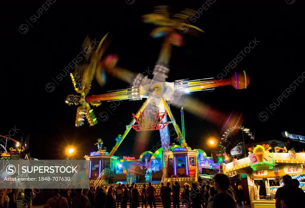 Oktoberfest, Wiesn, amusement rides, giant rotating pendulum at night, different rotational positions, Munich, Bavaria, Germany, Europe