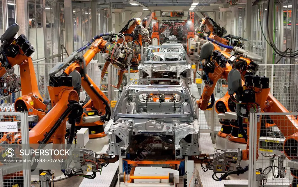 Industrial robots putting out car bodies on assembly line 2, Audi A4 Sedan, A4 Avant, A5 Coupe, A5 Sportback and RS5, Audi plant in Ingolstadt, Bavari...