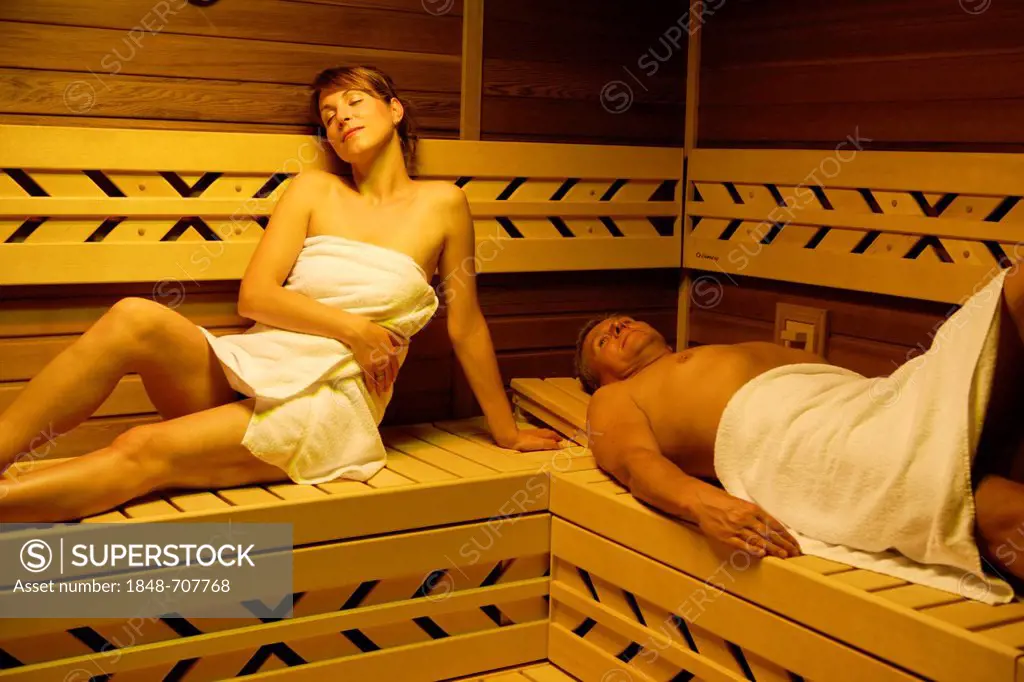 Couple in a sauna, woman, 35 years, and man, 54 years