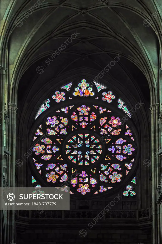 Stained glass rose window, the creation of the world, in St. Vitus Cathedral, Prague Castle, Castle District, Hradcany, Prague, Bohemia, Czech Republi...