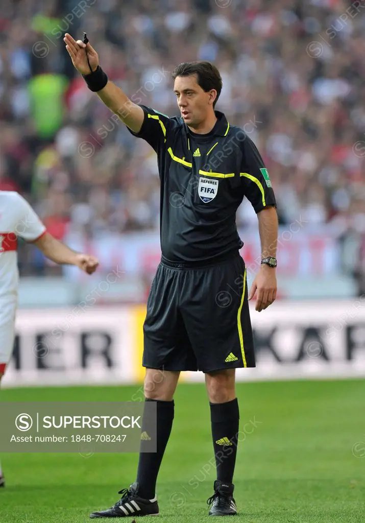 Referee Manuel Graefe awarding a free kick, Mercedes-Benz Arena, Stuttgart, Baden-Wuerttemberg, Germany, Europe