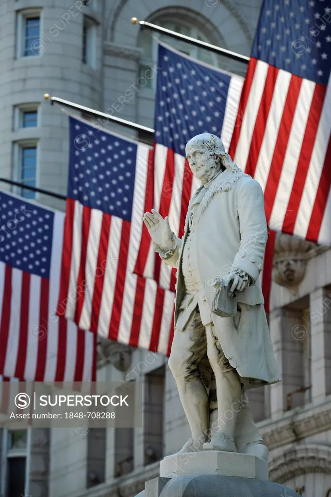 Benjamin Franklin statue in front of the Nancy Hanks Center, NEA, former Old Post Office Pavilion, US flags, Washington DC, District of Columbia, Unit...