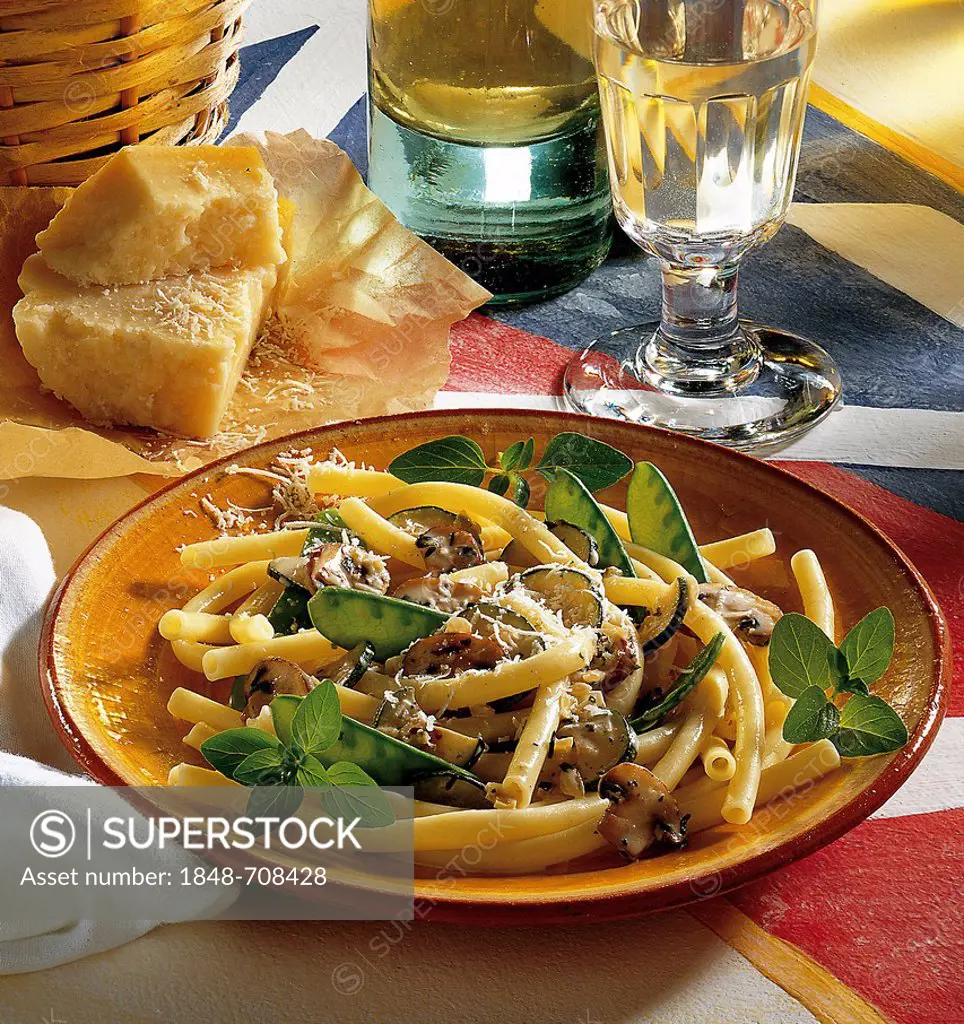 Macaroni with spring vegetables, zucchini, snow peas and mushrooms, Parmesan, Italy