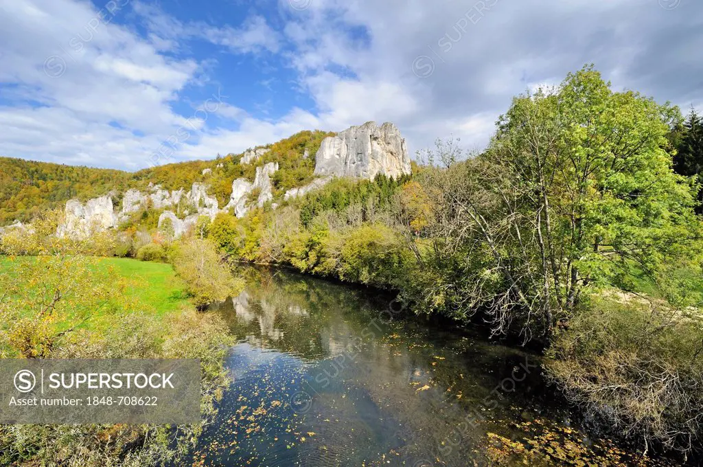 Jurassic limestone rocks are reflected in the Danube, Sigmaringen district, Baden-Wuerttemberg, Germany, Europe