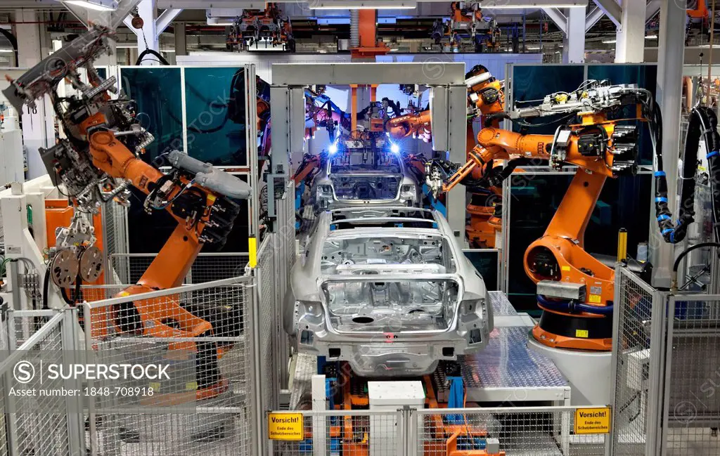 Industrial robots soldering roof panels of Audi vehicles using Plasmatron, A4 Sedan, A4 Avant, A5 Coupe, A5 Sportback and RS5, Audi plant in Ingolstad...