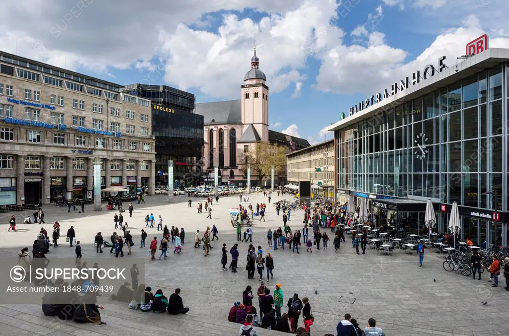 View from Domplatte square towards Bahnhofsvorplatz square, with main railway station on the right and the Church of St. Mary of the Assumption in the...