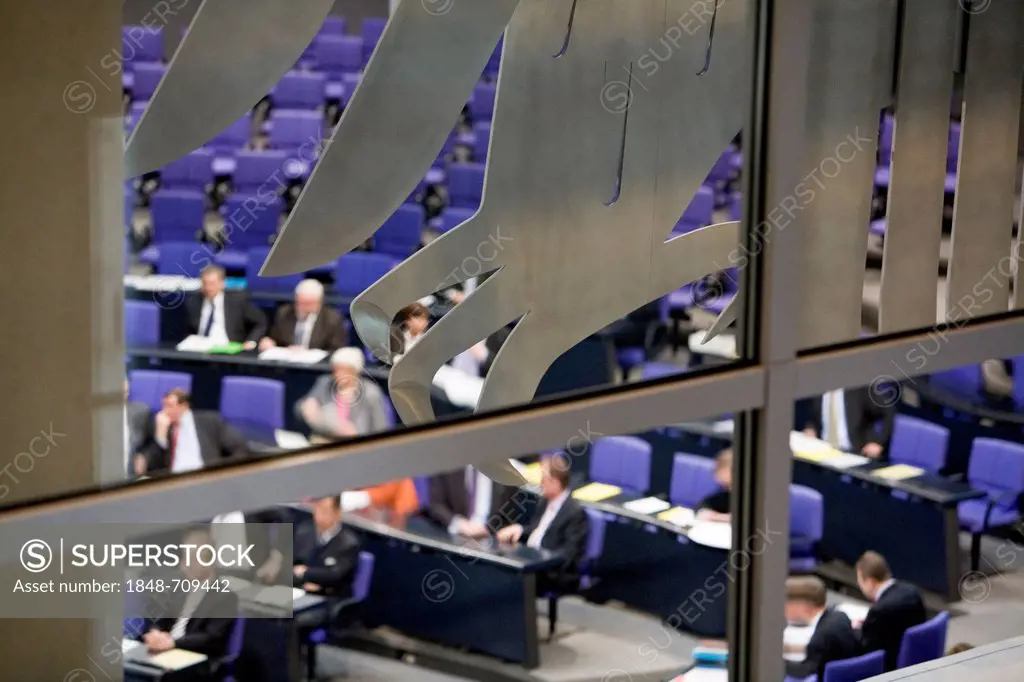 Deutscher Bundestag, German parliament, session in the plenary hall of the Reichstag building, parts of the federal eagle at front, Berlin, Germany, E...