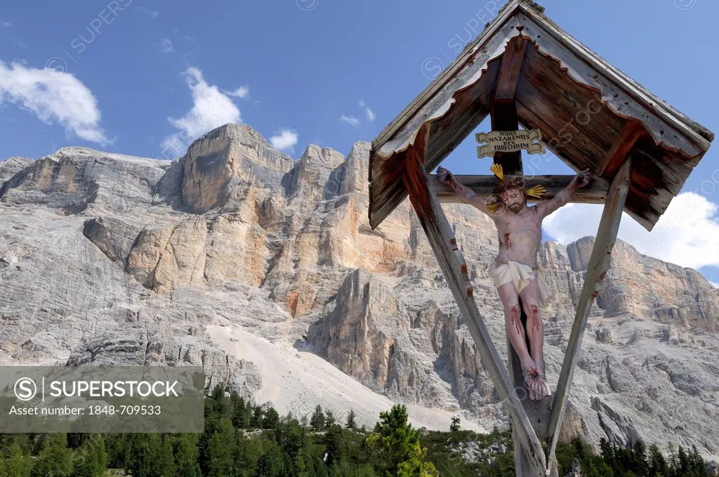 Crucifix in front of mountains, near church and Hospice of Santa Croce, Dolomites, Alta Badia, province of Bolzano-Bozen, Italy, Europe