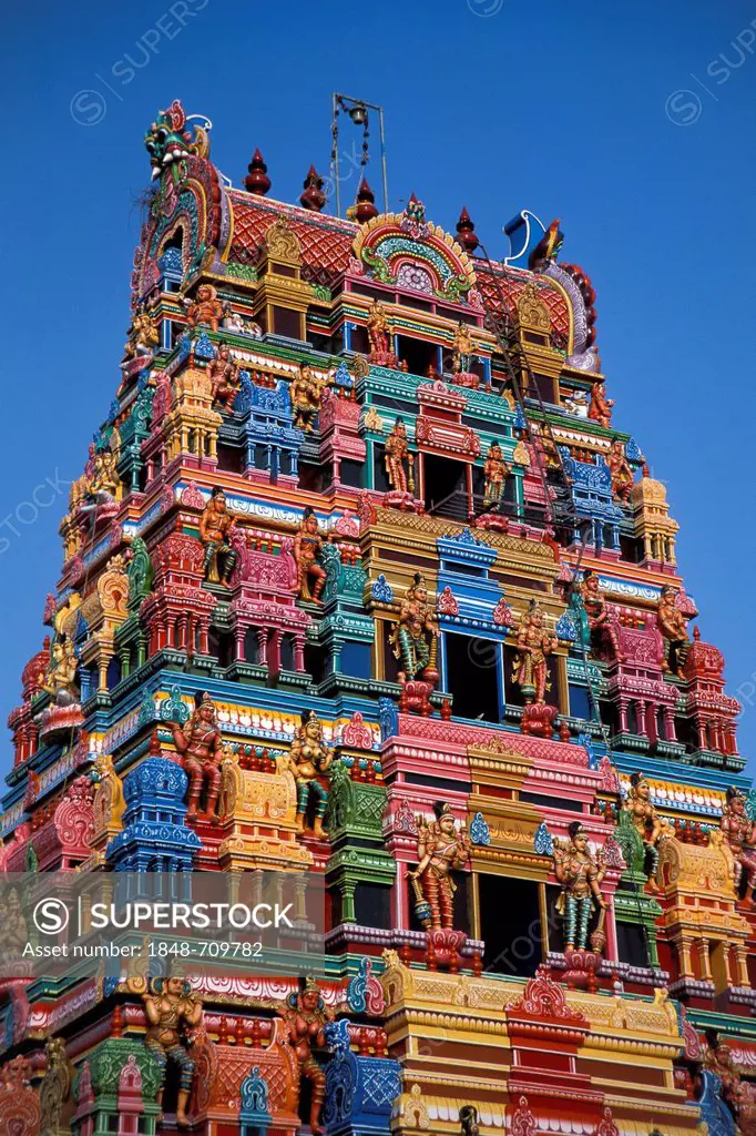 Colourful Hindu temple tower or Gopura, near Karaikudi, Chettinad, Tamil Nadu, South India, India, Asia