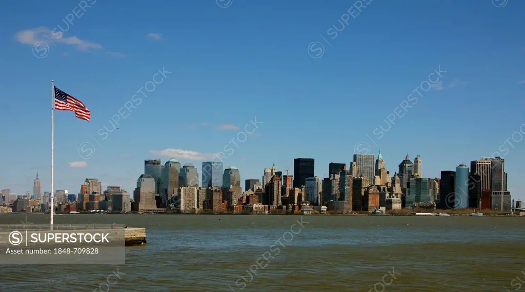 Skyline of Manhattan, American flag, New York City, New York, United States, North America