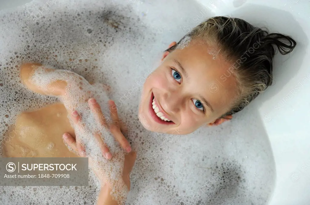 Young girl in a bathtub