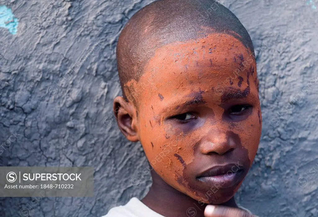 Xhosa boy smeared with clay, portrait, during the Sangoma or Witchdoctor Festival, Wild Coast, Eastern Cape, South Africa, Africa