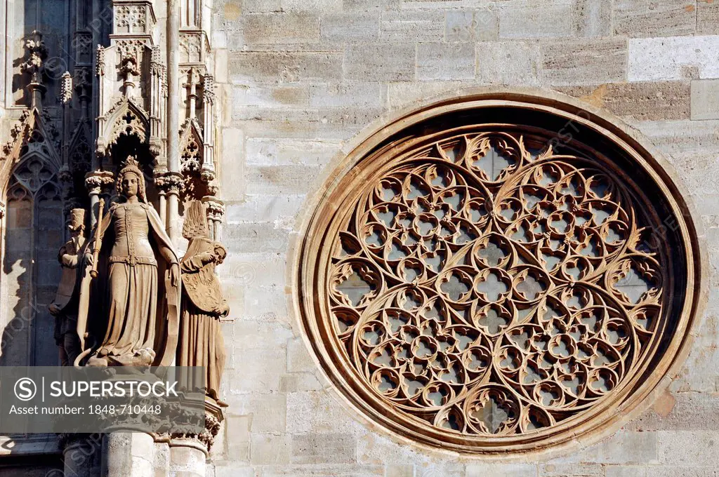 Gothic tracery and figures on Stephansdom, St. Stephen's Cathedral, Stephansplatz, Vienna, Austria, Europe