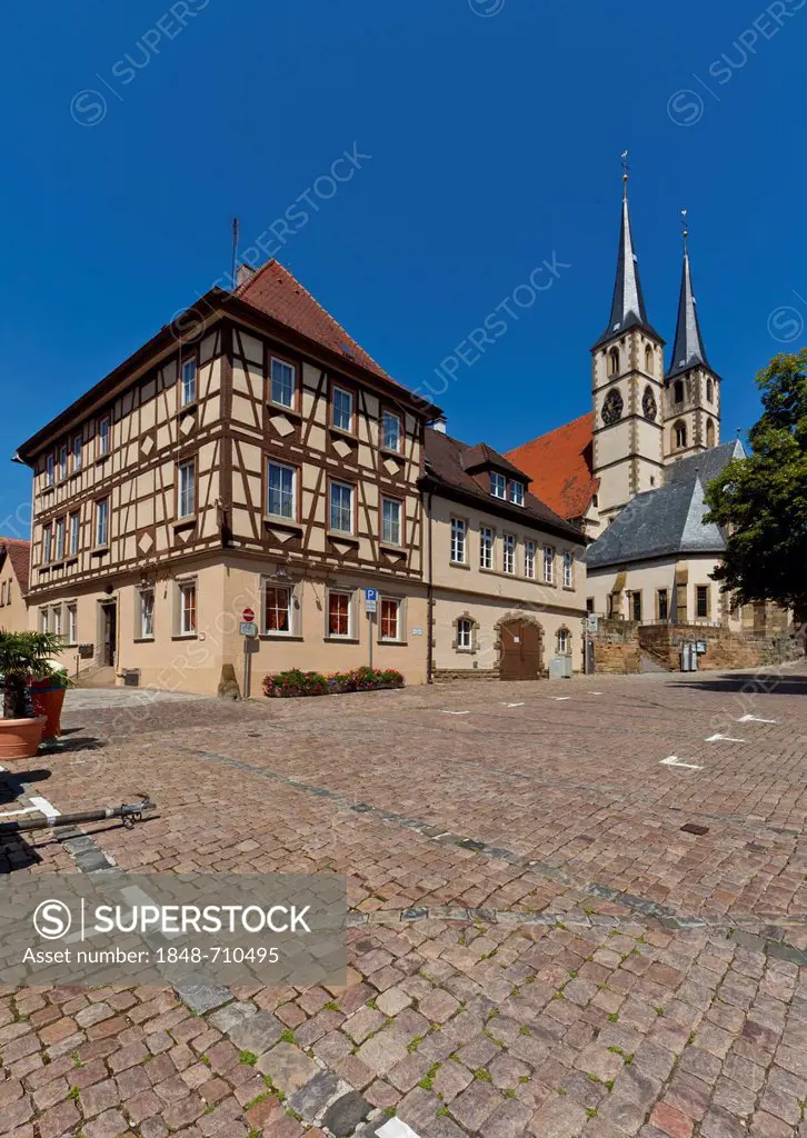 Franconian half-timbered buildings with the Collegiate Church of St. Peter, historic town centre of Bad Wimpfen, Neckartal, Baden-Wuerttemberg, German...