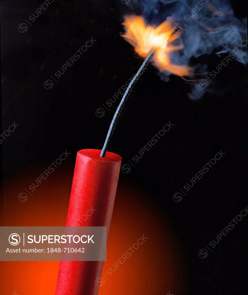 Stick of dynamite with the fuse burning