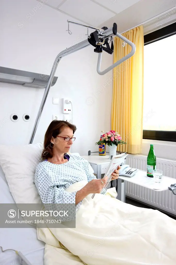 Patient lying in a hospital bed, hospital room, single room, hospital
