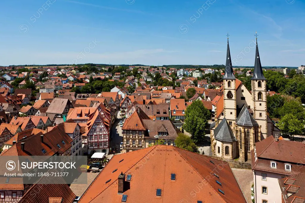 Franconian half-timbered buildings with the Collegiate Church of St. Peter, historic town centre of Bad Wimpfen, Neckartal, Baden-Wuerttemberg, German...