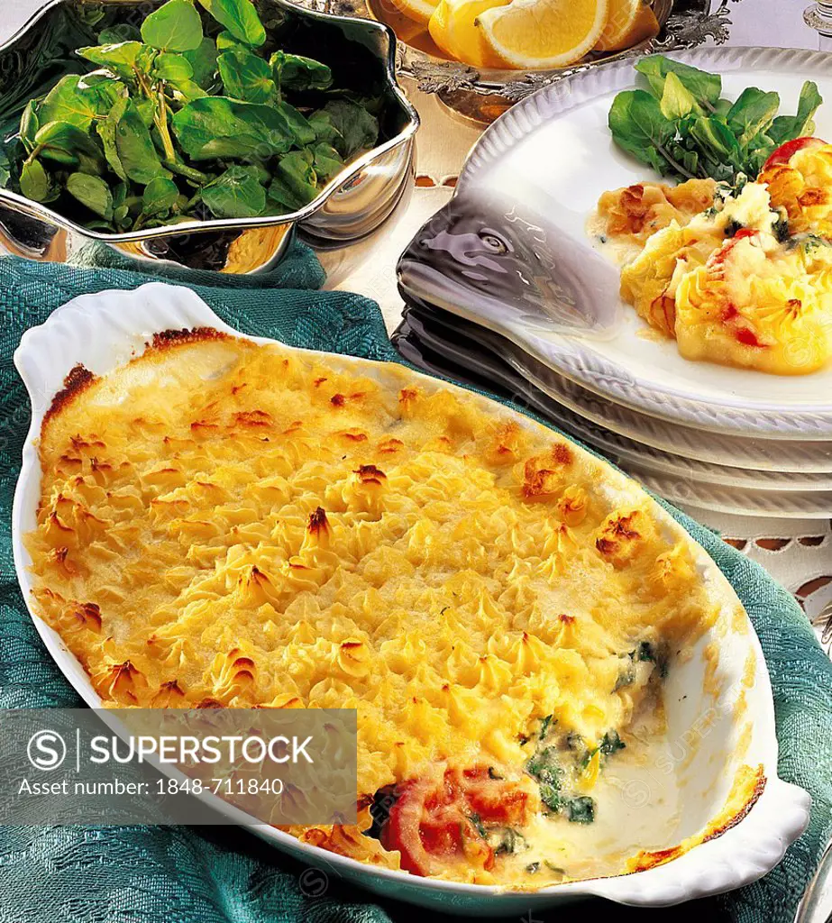 Cod casserole covered with layer of potato, Great Britain