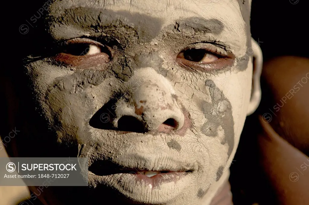 Xhosa boy smeared with clay, portrait, during the traditional circumcision ceremony, Wild Coast, Eastern Cape, South Africa, Africa