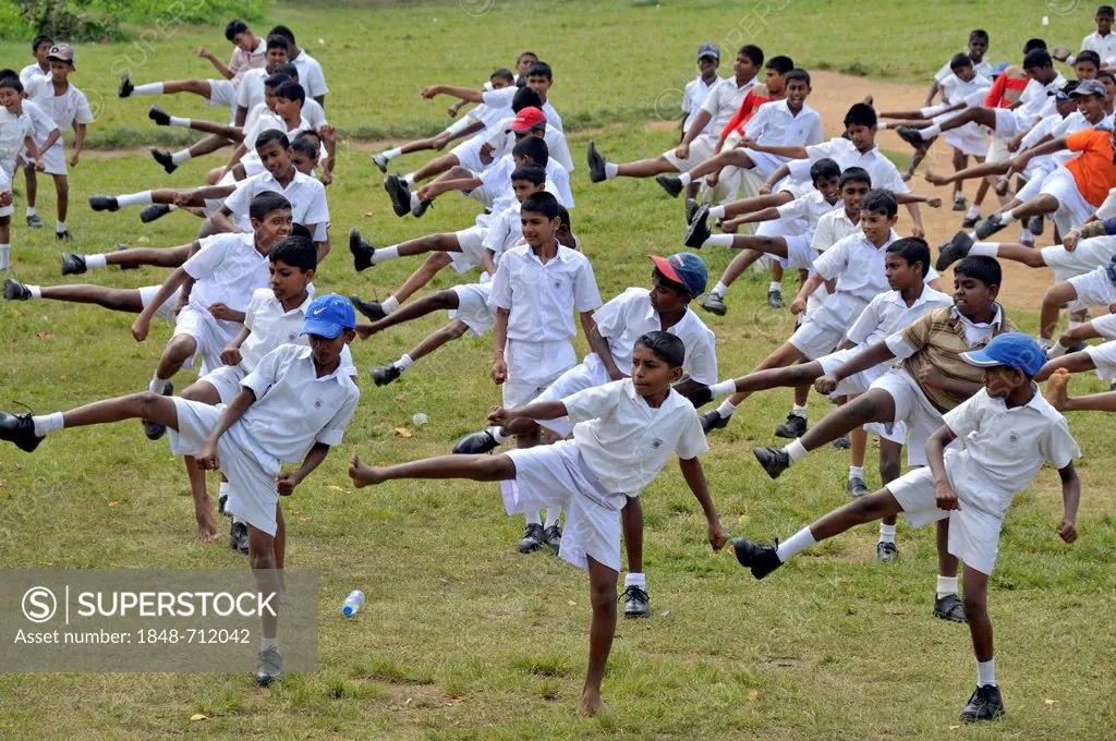 Karate training, boys wearing white school uniforms, Galle, Sri Lanka, Ceylon, Asia, PublicGround