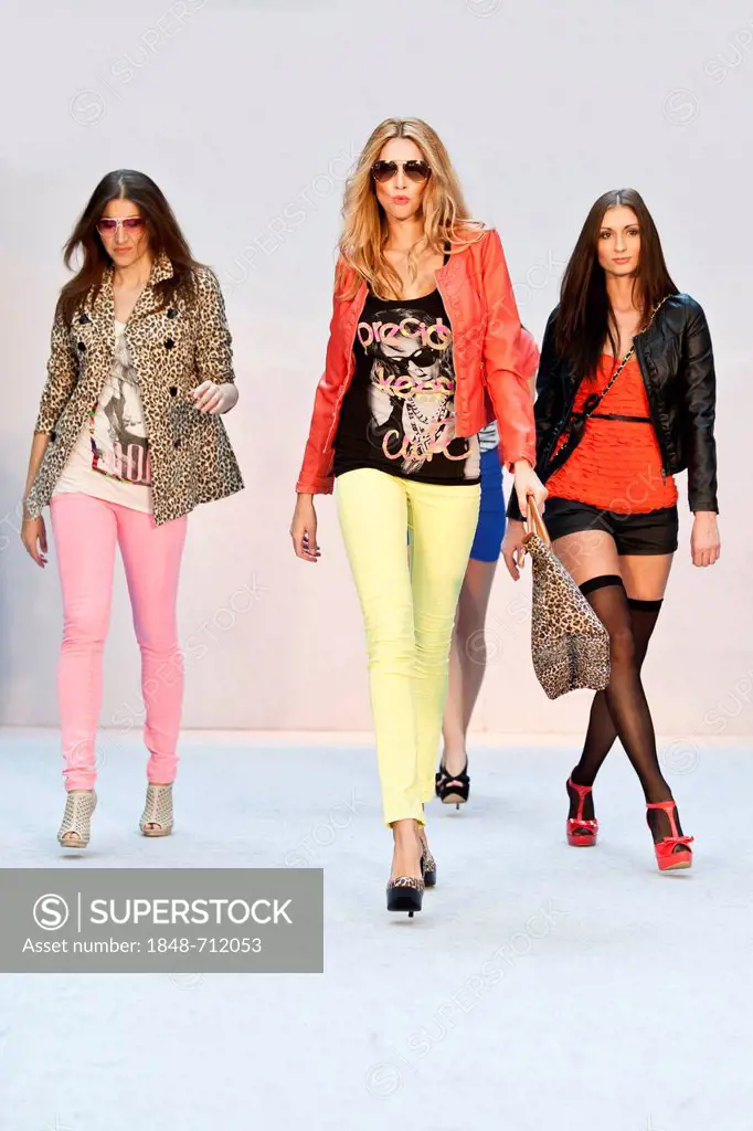 4 young women, models performing in the Spring and Summer Fashion Show 2012 in Pilatusmarkt in Kriens, Lucerne, Switzerland, Europe