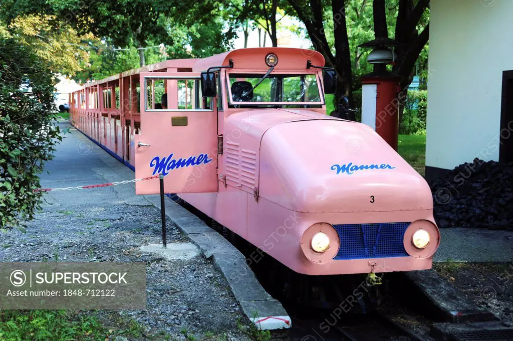 Old pink diesel locomotive with Manner wafers logo, Prater, Vienna, Austria, Europe