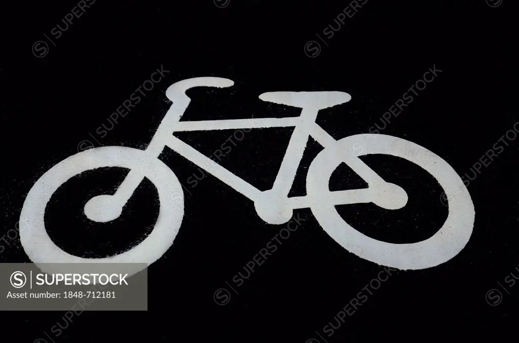 Bicycle lane, bicycle pictogram painted on ground