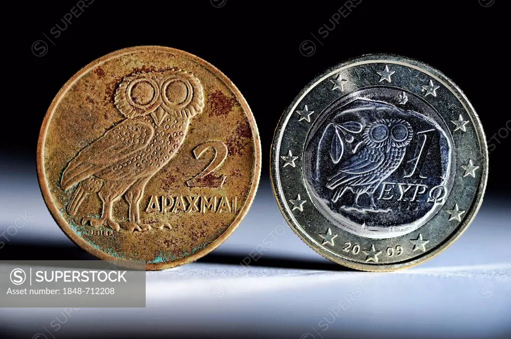 Greek drachma and a Greek one-euro coin