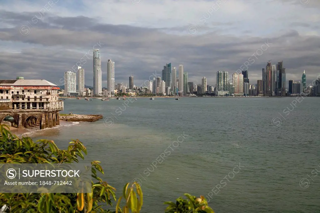 Skyline of Panama City, with a ramshackle house in the front of the Old City, Panama, Central America