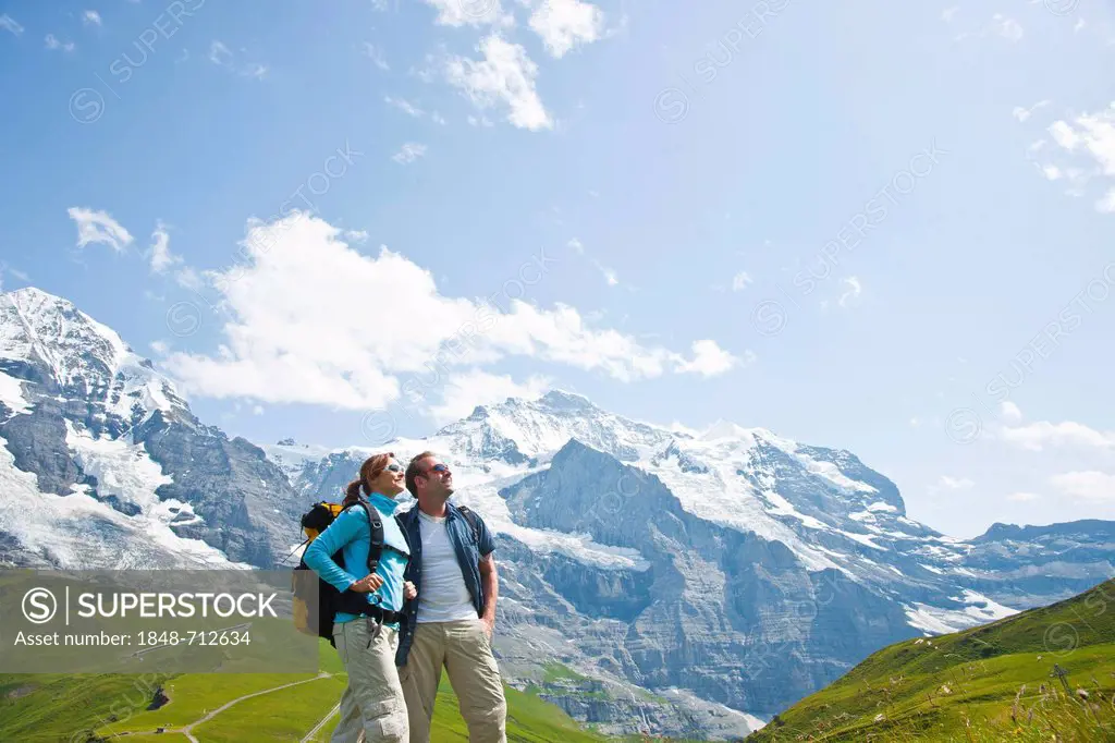 Hikers in the Swiss Alps, Grindelwald, Bernese Oberland, Switzerland, Europe