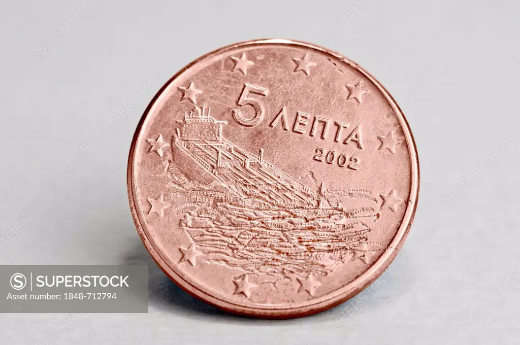 Manipulated 5 cent euro coin from Greece, the tanker is now sinking, symbolic image