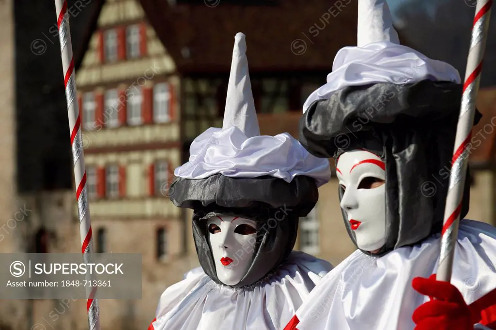 People wearing masks, bank of the Kocher River at the back, Hallia Venezia carnival, Schwaebisch Hall, Baden-Wuerttemberg, Germany, Europe