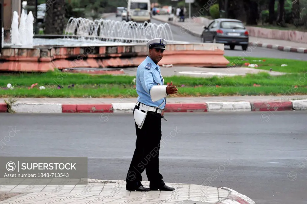 Police officer, traffic police, town centre, Morocco, Africa
