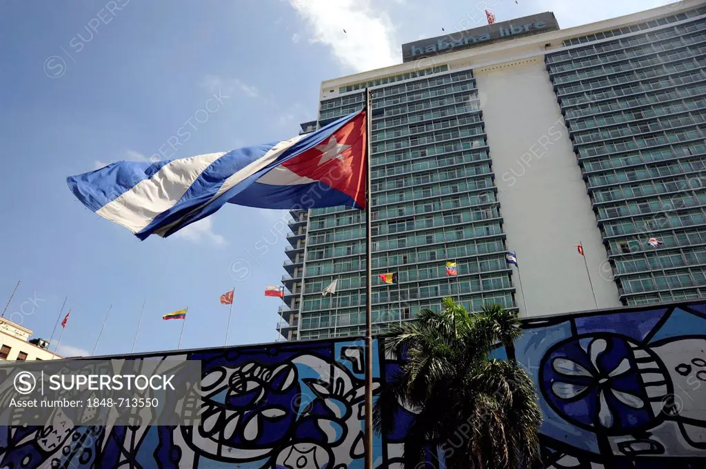 National Flag in front of the Hotel Habana Libre, La Rampa, city centre of Havana, Habana Vedado, Cuba, Greater Antilles, Caribbean, Central America, ...