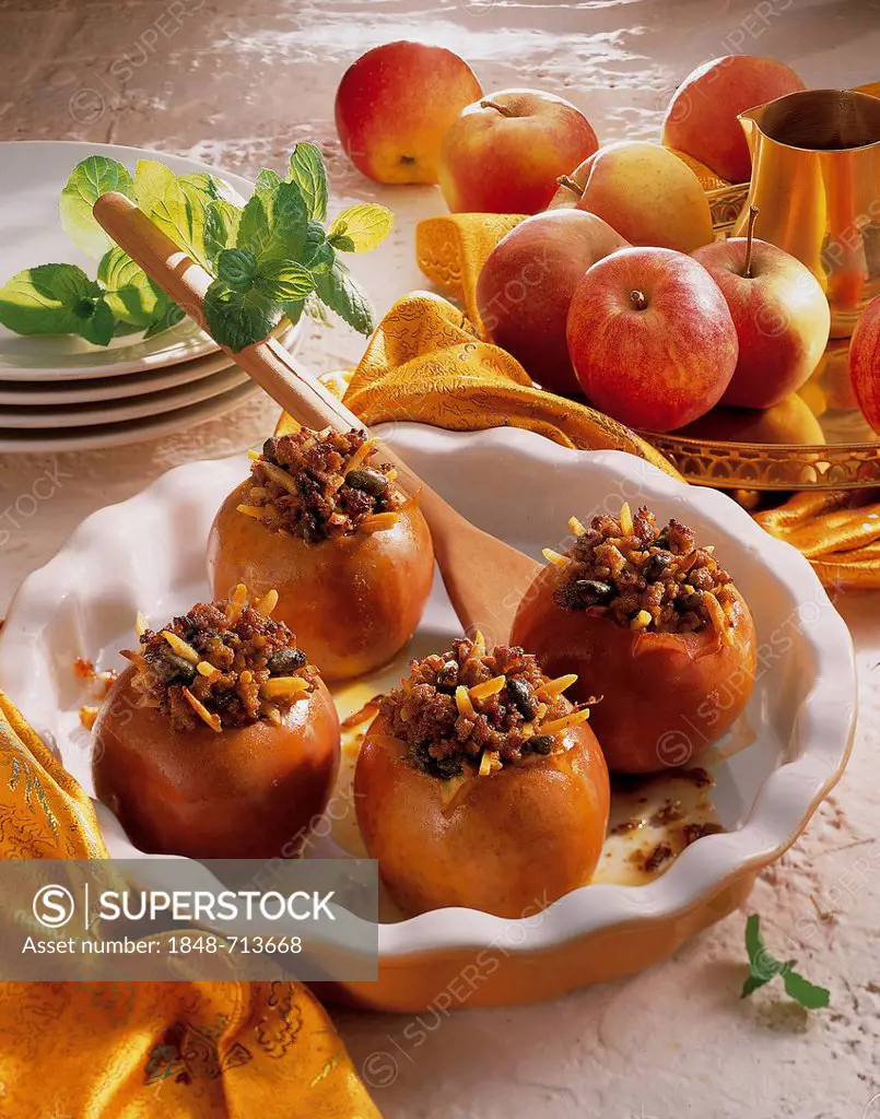 Spicy apples stuffed with minced lamb, saffron, mint, pistachios, almonds and raisins, Iran
