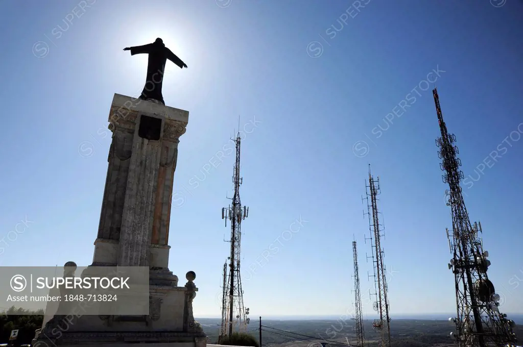 Christ statue between antenna masts on El Toro Mountain, Es Mercadal, Minorca, Menorca, Balearic Islands, Spain, Europe