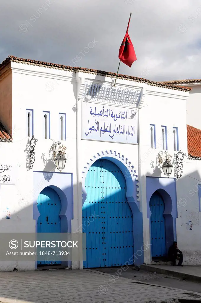 State building, facade with blue doors, Chefchaouen, northern Morocco, Morocco, Africa