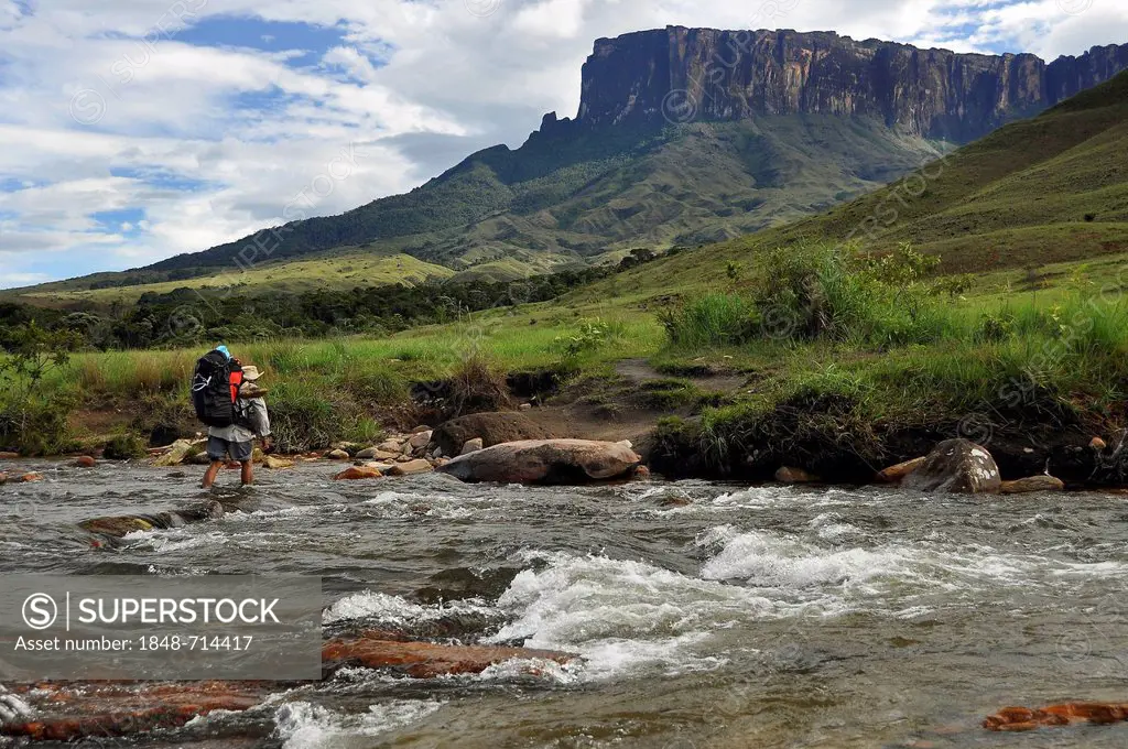 River crossing in front of the Kukunan table mountain, trail to the Roraima table mountain, highest mountain of Brazil, tri-border region Brazil, Vene...