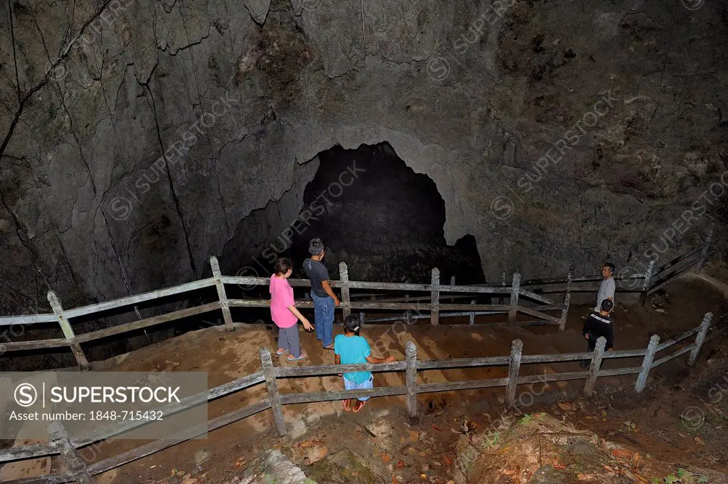 The Japanese Cave, Goa Jepang, a tourist attraction being visited by Javanese visitors, Battle of Biak, Pacific War, near Kota Biak on Biak Island in ...